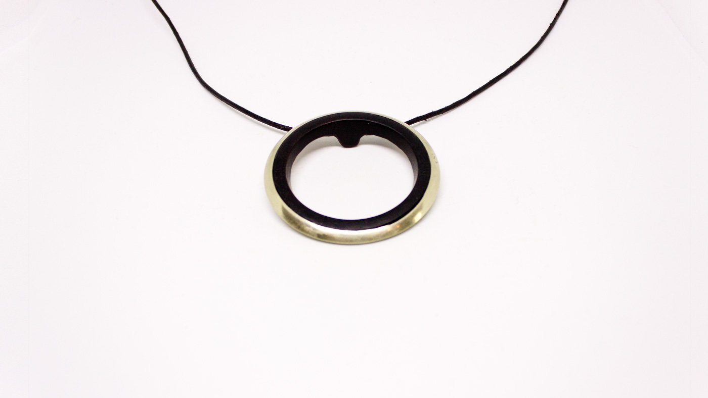 134 Rundumadum Anhänger, Grenadil Messing